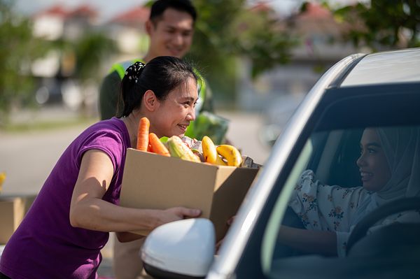 Women providing produce at a food bank