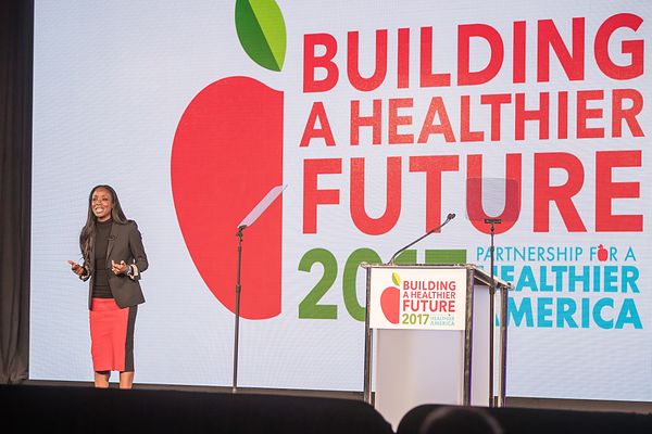 Dr. Nadine Burke Harris, Founder & CEO of the Center for Youth Wellness (CYW), delivers a plenary session presentation at Partnership for a Healthier America's 2017 Building a Healthier Future Summit. 