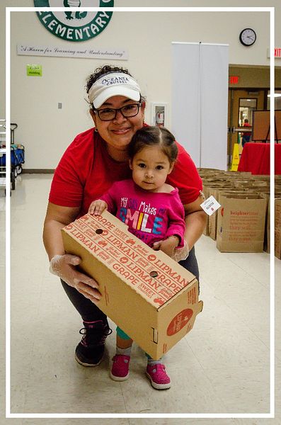 Image of a mother and child at a Brighter Bites event. 