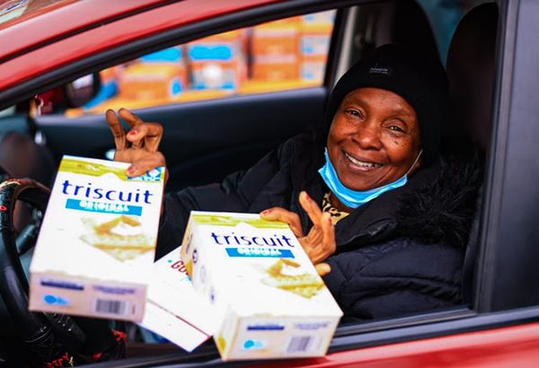 Women holding TRISCUIT boxes as part of Good Food for All DC