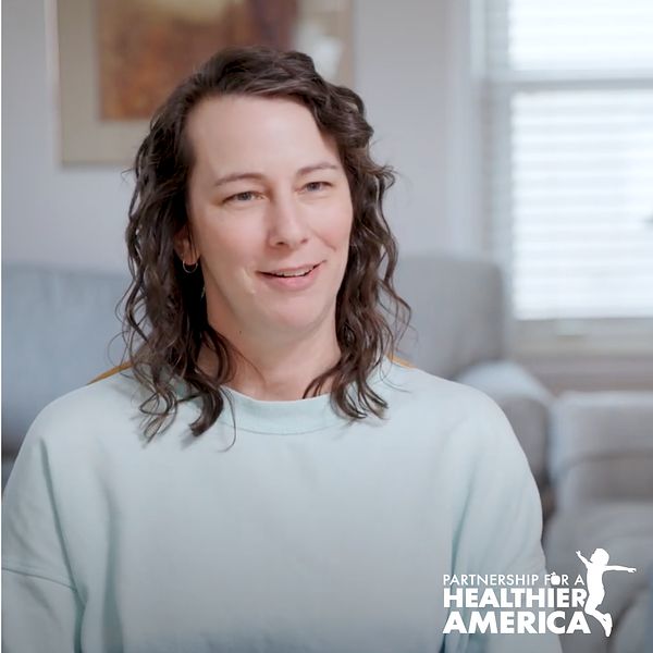 Joanna of Detroit, MI smiling as she is being interviewed for PHA's Good Food for All storytelling project