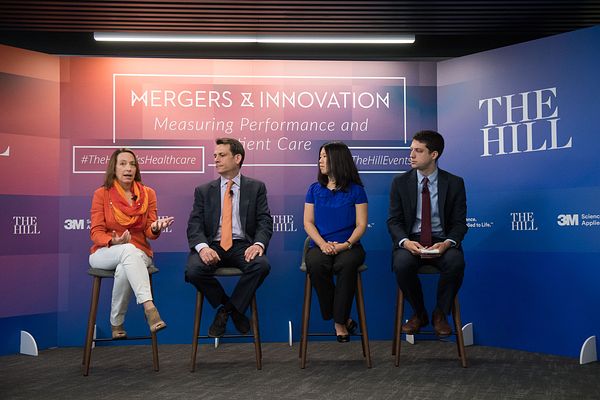 From left: Nancy Roman, President and CEO of Partnership for a Healthier America, speaking on the 'Healthcare Redefined' panel at the Hill's Mergers and Innovation: Measuring Performance and Patient Care event on June 26, 2018. Also pictured: Emily Gee, Healthcare Economist at Center for American Progress; Cory Capps, Partner, Bates White Economic Consulting; and, Peter Sullivan, Staff Writer at the Hill (Moderator). 