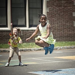 Image of children playing at recess. 