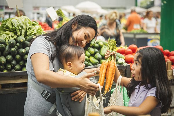 Mom and kids shopping