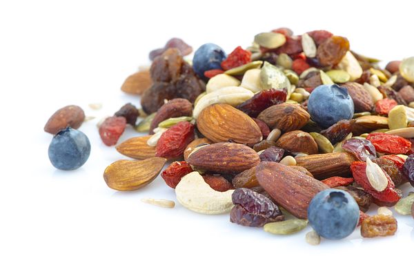 Image of trail mix containing nuts and dry fruit. 