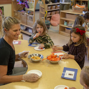 Chef Delanya sharing healthy snacks with students