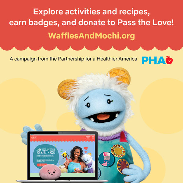 An image of Waffles and Mochi looking at the wafflesandmochi.org website