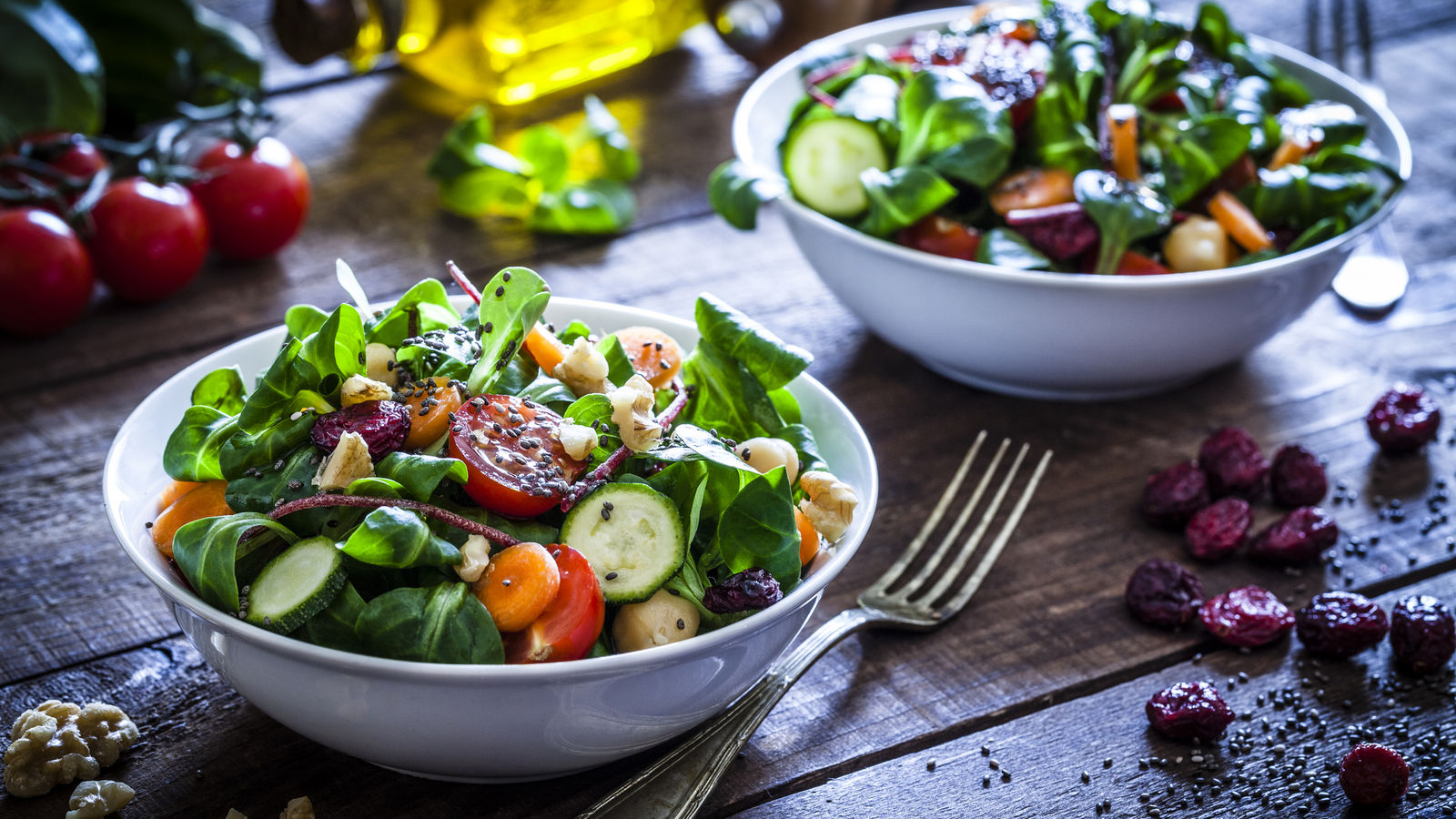 A bowl of fresh vegetables and fruit