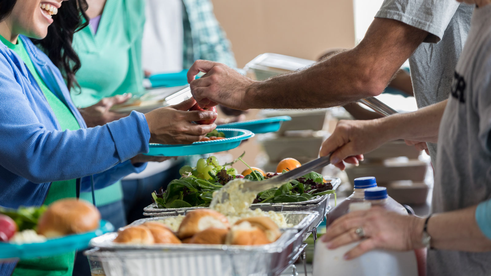 Image of a person receiving a healthy meal at food bank.