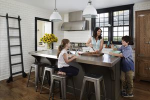 Image of a family cooking in a kitchen from Family Circle.