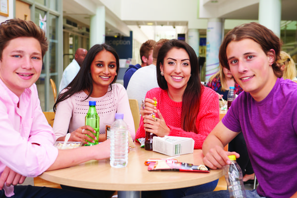 Image of students in the cafeteria at a college. 