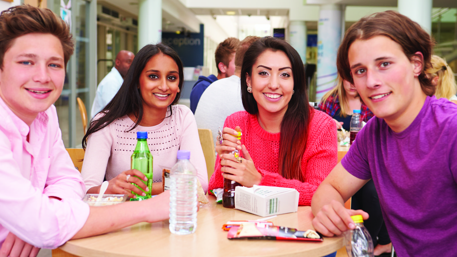 Image of students in the cafeteria at a college.