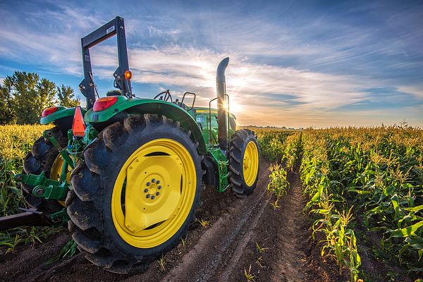 commercial tractor in field 