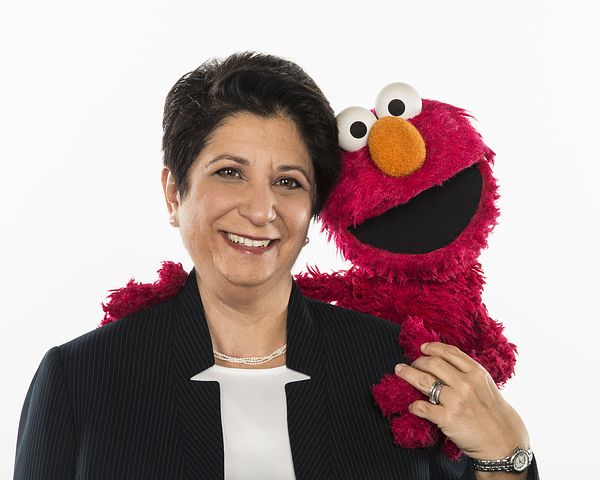 Image of Sesame Workshop's Rosemarie T. Truglio, Ph.D with Elmo. 