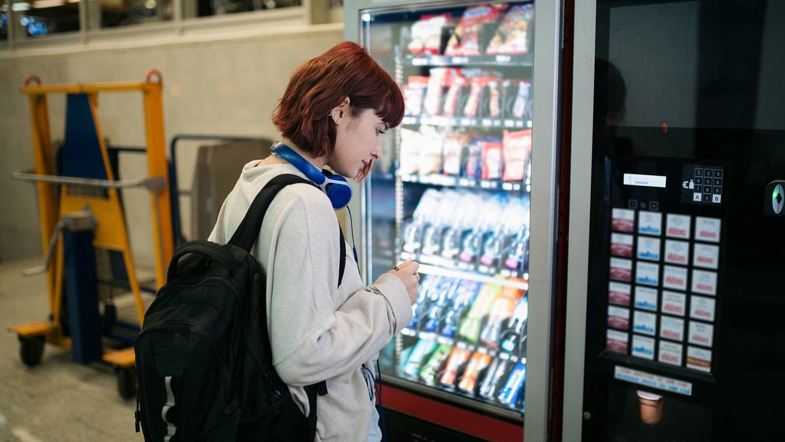 Girl and vending machine