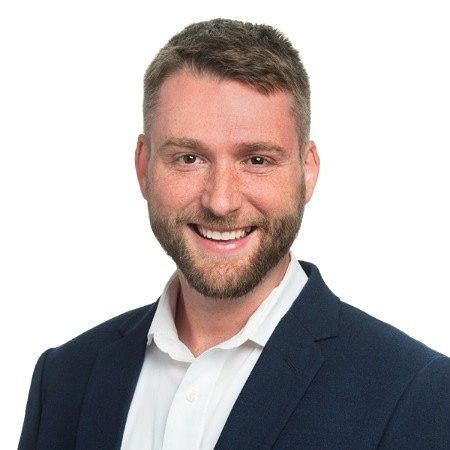 A headshot of Jason Wilson