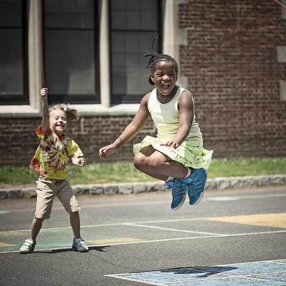 Image of children playing at recess. 